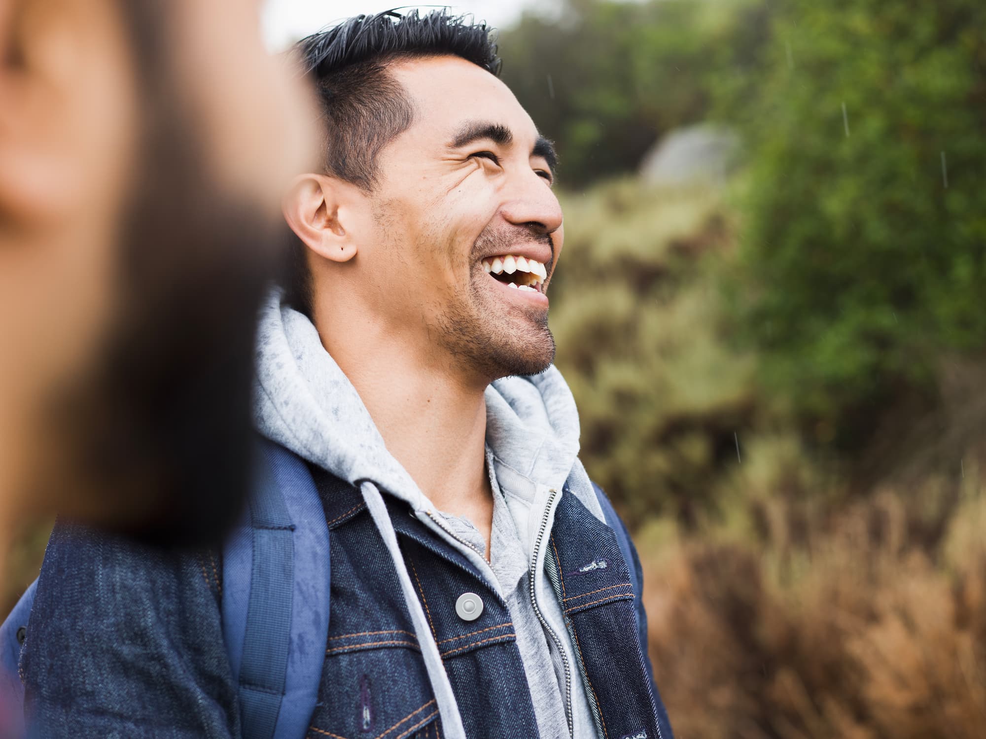 two-men-one-laughing-with-his-head-back-2023-11-27-04-57-06-utc